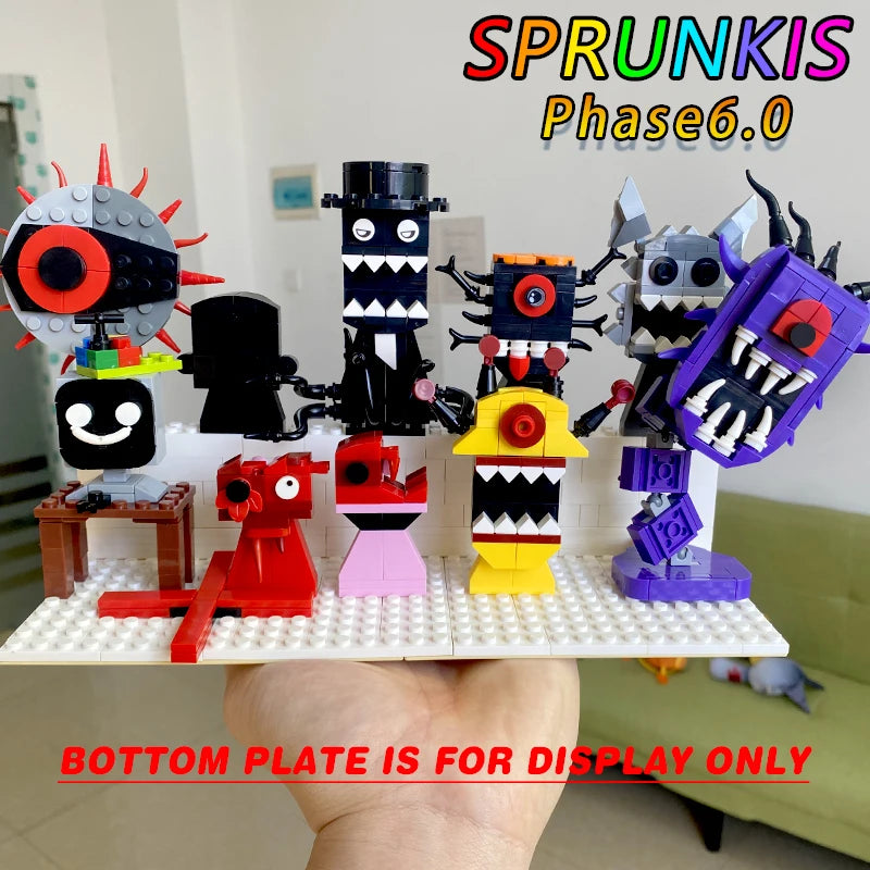 Collection of colorful toy figures on a white baseplate with 'Sprunkis Phase6.0' branding.