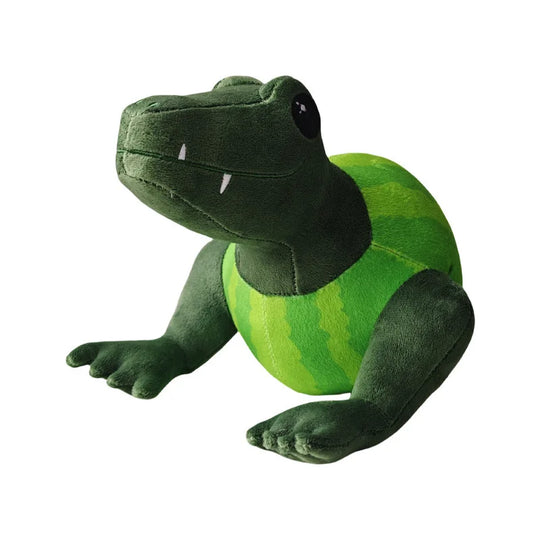 Green plush toy lizard on a white background