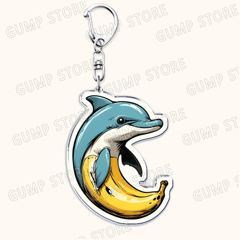 Dolphin-shaped keychain with a banana design on a white background