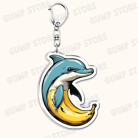Dolphin-shaped keychain with a banana design on a white background