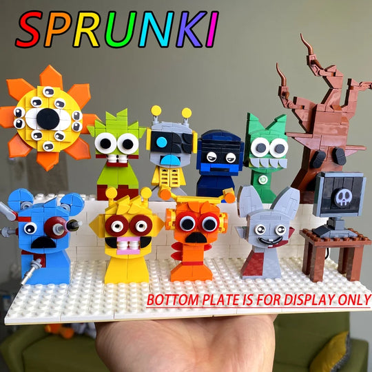 Colorful toy figures on a display base with 'Sprunki' branding.