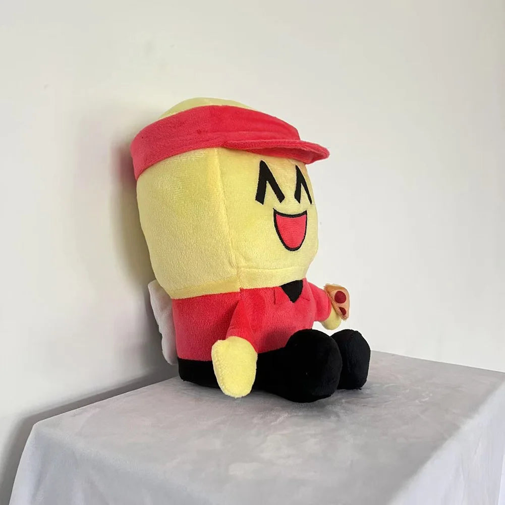 Plush toy with a happy face design on a white surface