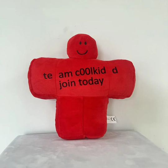 Red plush toy with text on a white background