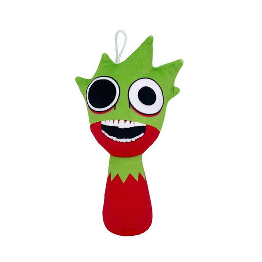 Green and red toy with large eyes on a white background
