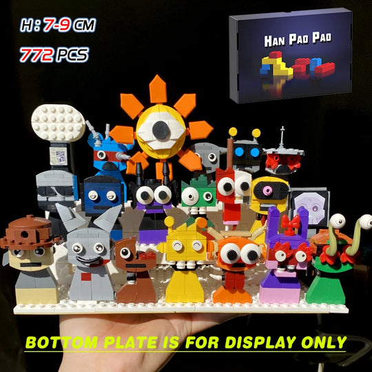 Collection of colorful toy figures made from building blocks with 'HAN PAO PAO' branding above.