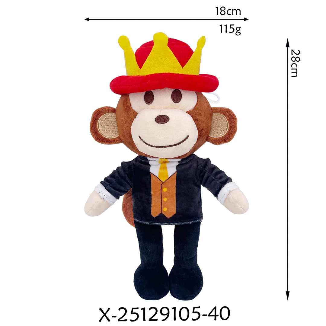 Stuffed monkey toy with a crown and measurements on a white background