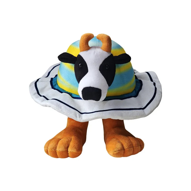 Plush toy cow with shell shell on a white background