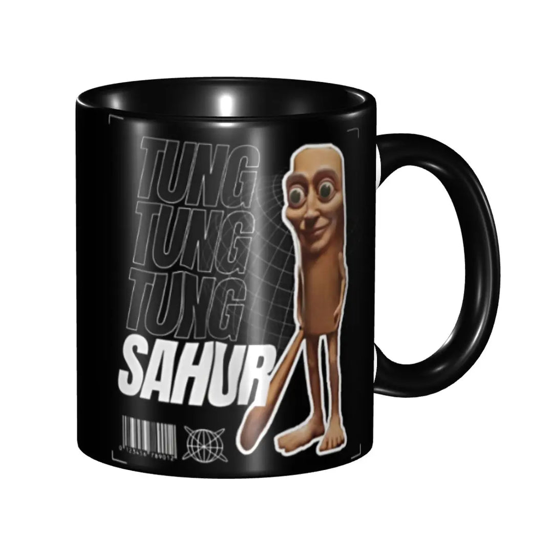 Black mug with cartoon sloth standing upright next to bold white text "SAHUR" on a shaded background. The tone is playful and humorous.