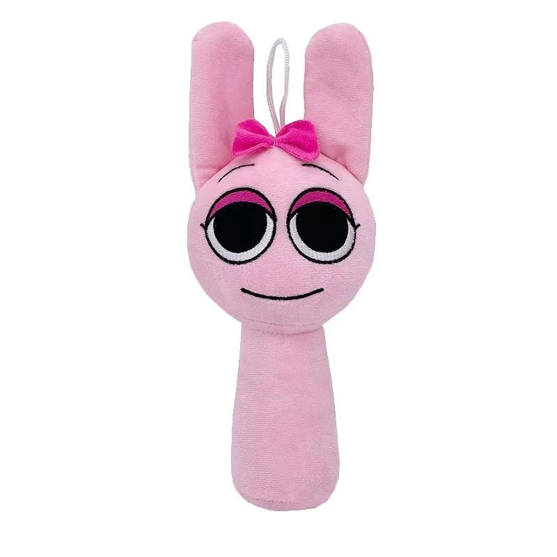 Pink plush toy with bunny ears and a bow on a white background