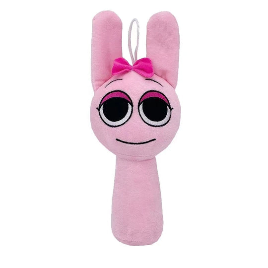 Pink plush toy with bunny ears and a bow on a white background